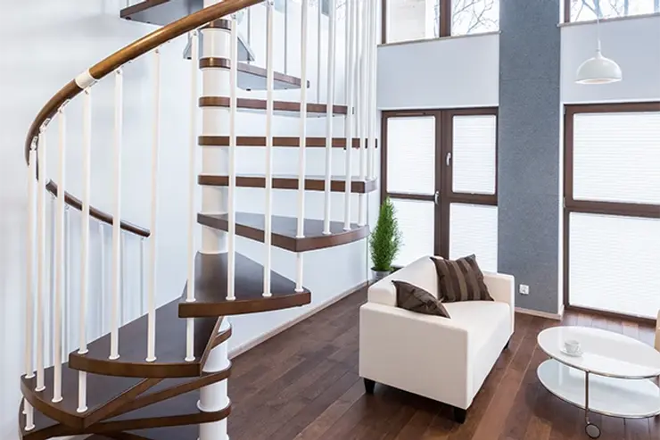 Spiral staircase with white spindles
