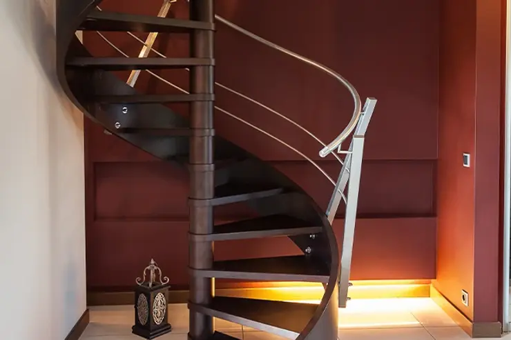 Black spiral staircase with metal baluster