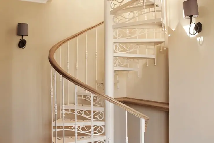 Intricate design white spiral staircase