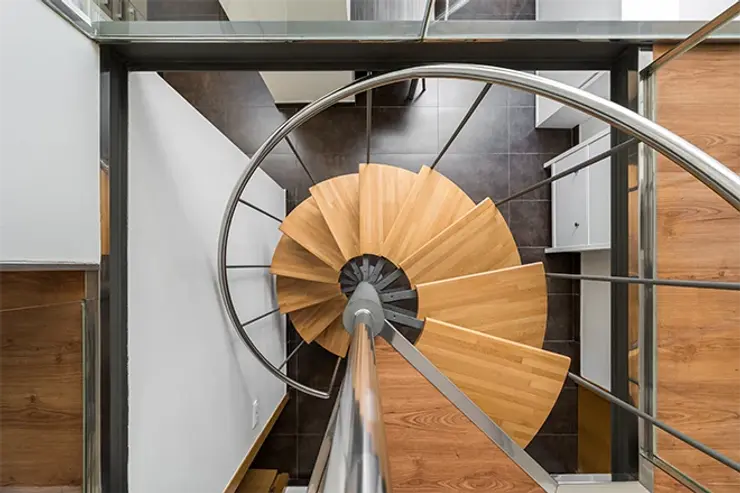 Wood and metal spiral staircase