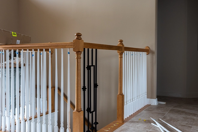 A step in the process of how to replace balusters on interior stairs