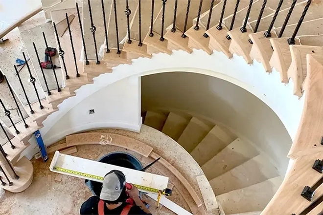 Stair Creations team remodeling an interior staircase