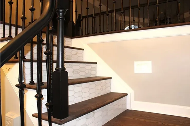 Stairs with cool tile risers as one of the staircase remodel ideas
