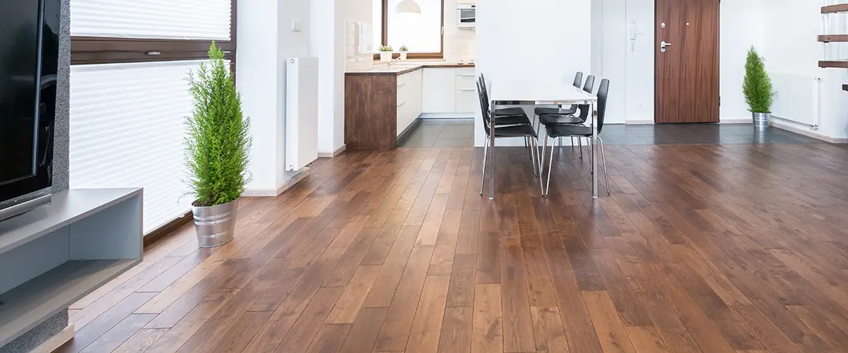 hardwood flooring in kitchen and dining area with modern layout