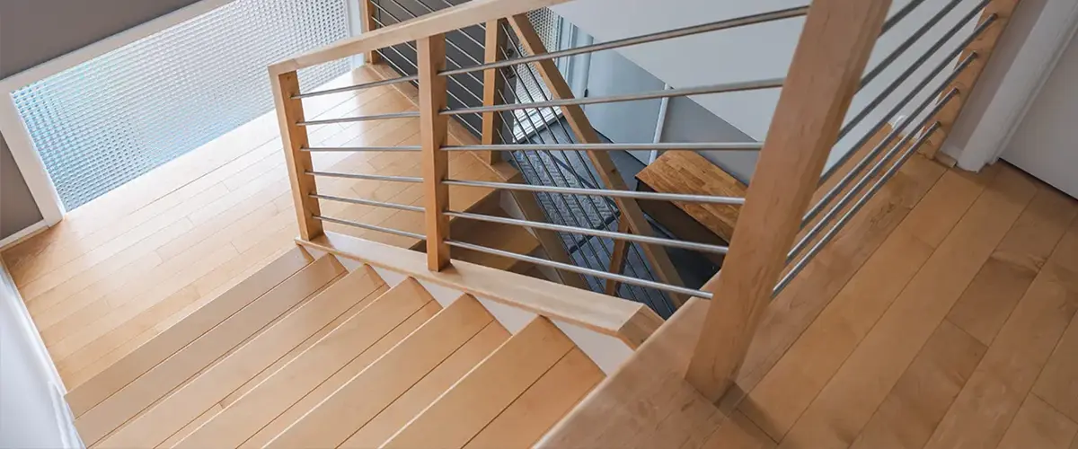 Stair Railing Installation in Springfield, VA 15 Contemporary wood stairs with stainless steel horizontal railing and hardwood flooring
