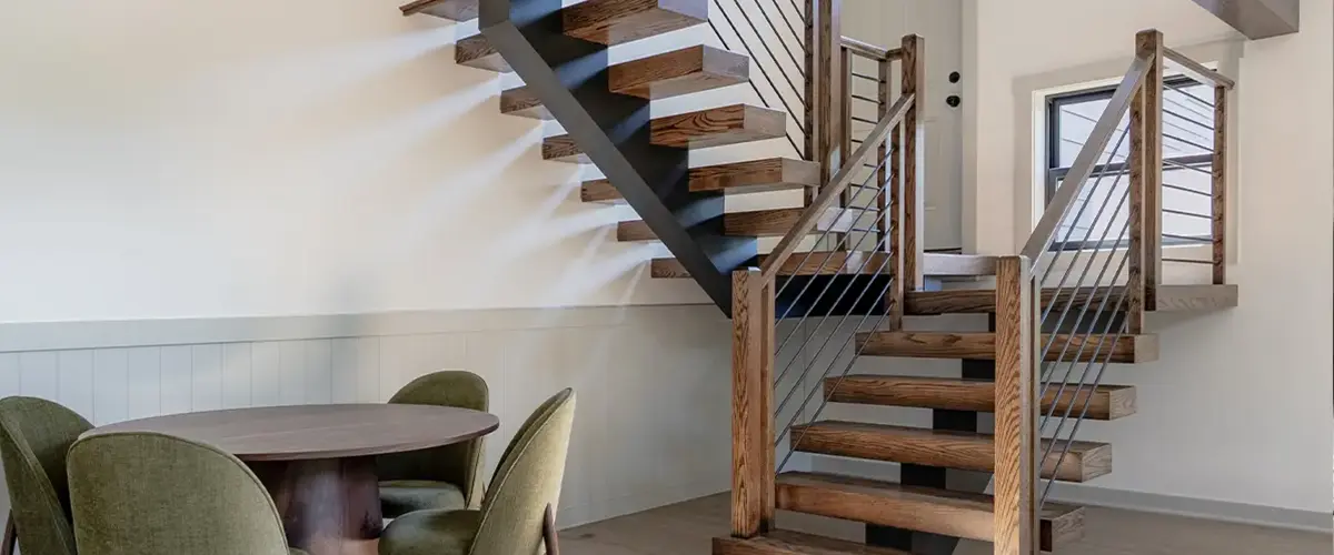 Stair Design in Vienna, VA 2 Floating wood staircase with cable railing in contemporary dining room design