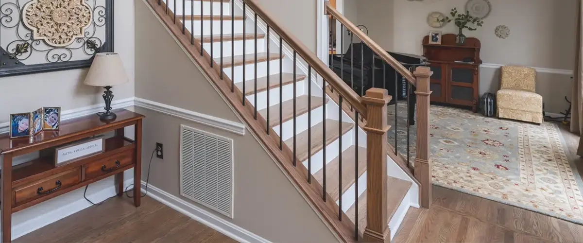 Stair Design in Vienna, VA 15 Traditional hardwood staircase with black iron balusters in elegant home interior